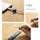 Magnetic cable organizer clip for desk or workspace — keeps charging cables neatly in place and tangle-free
